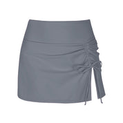 Gray swim skirt with ruched side flat lay