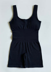 Black ribbed bodysuit flat lay