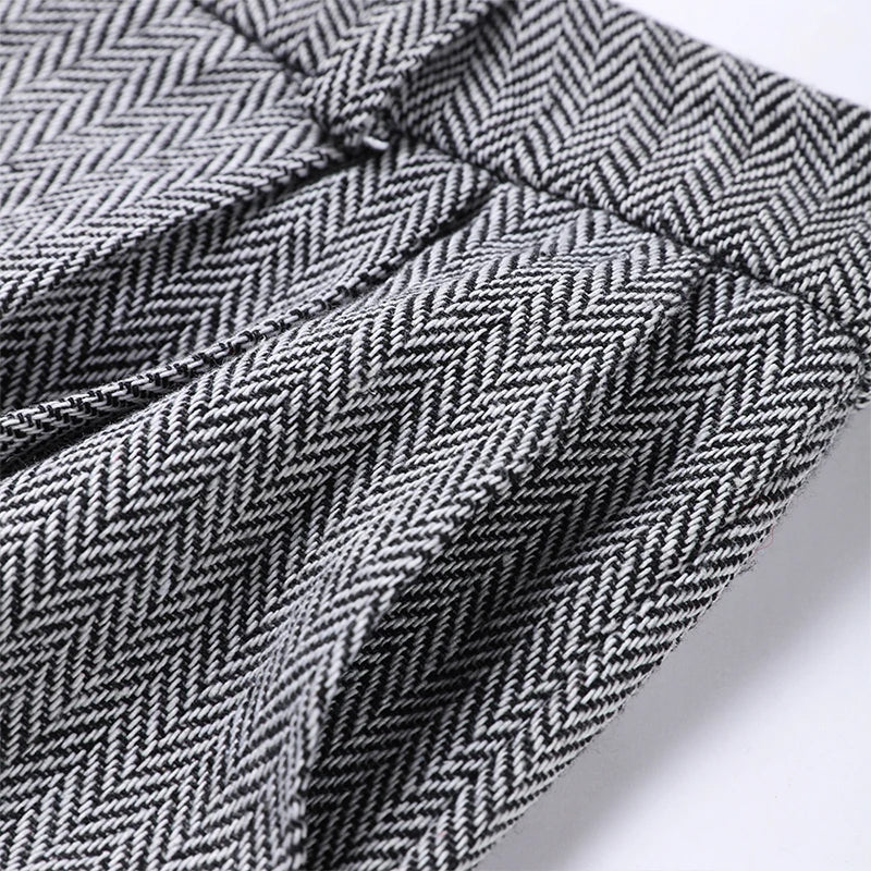 Blazer met herringbone patroon zwart-wit detailopname