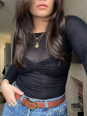 Black off-shoulder top with ruched detail studio close-up