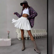 White pleated skirt with elastic waist side view