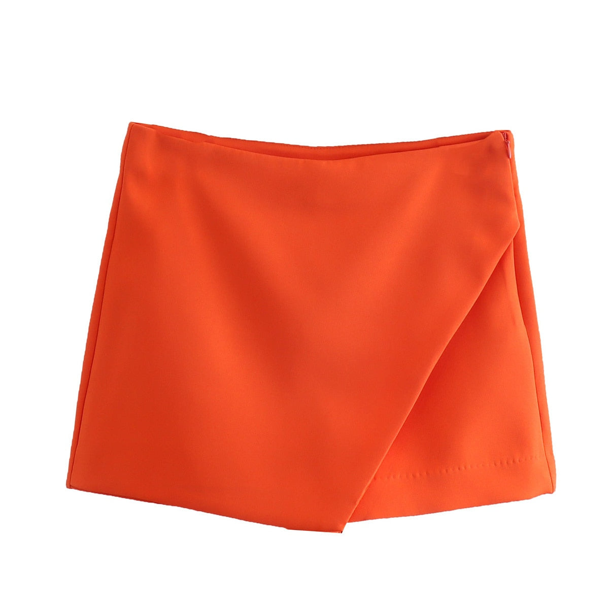 Korte broek met roklook oranje detailopname