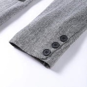 Blazer met herringbone patroon en zwarte knopen detail