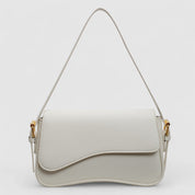 White shoulder bag with textured leather and gold hardware front view