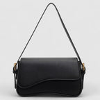 Black shoulder bag with textured leather and gold hardware front view