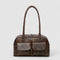 Brown leather shoulder bag with front pockets, front view