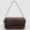 Brown shoulder bag with textured leather and gold hardware front view