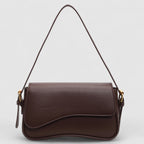 Brown shoulder bag with textured leather and gold hardware front view