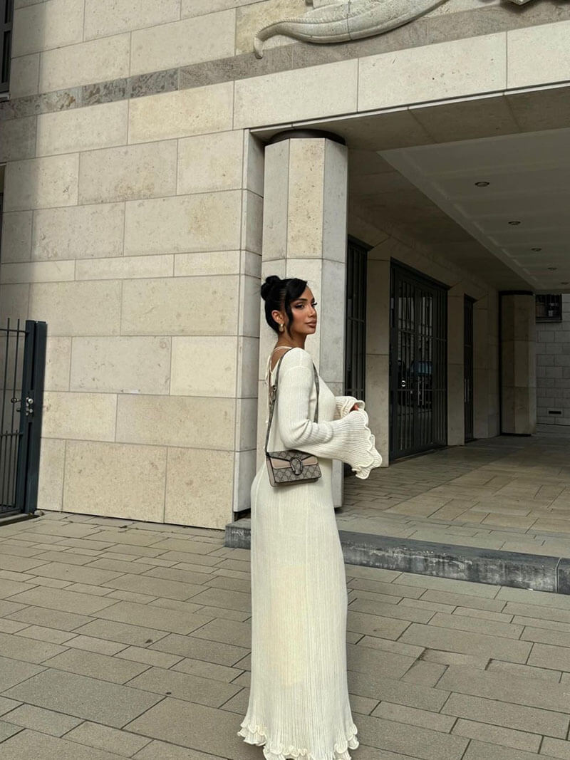 White maxi dress with ruffles and pleats, back view