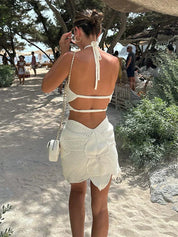 White crochet mini dress with floral pattern back view
