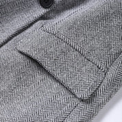 Blazer met herringbone patroon grijs detail shot