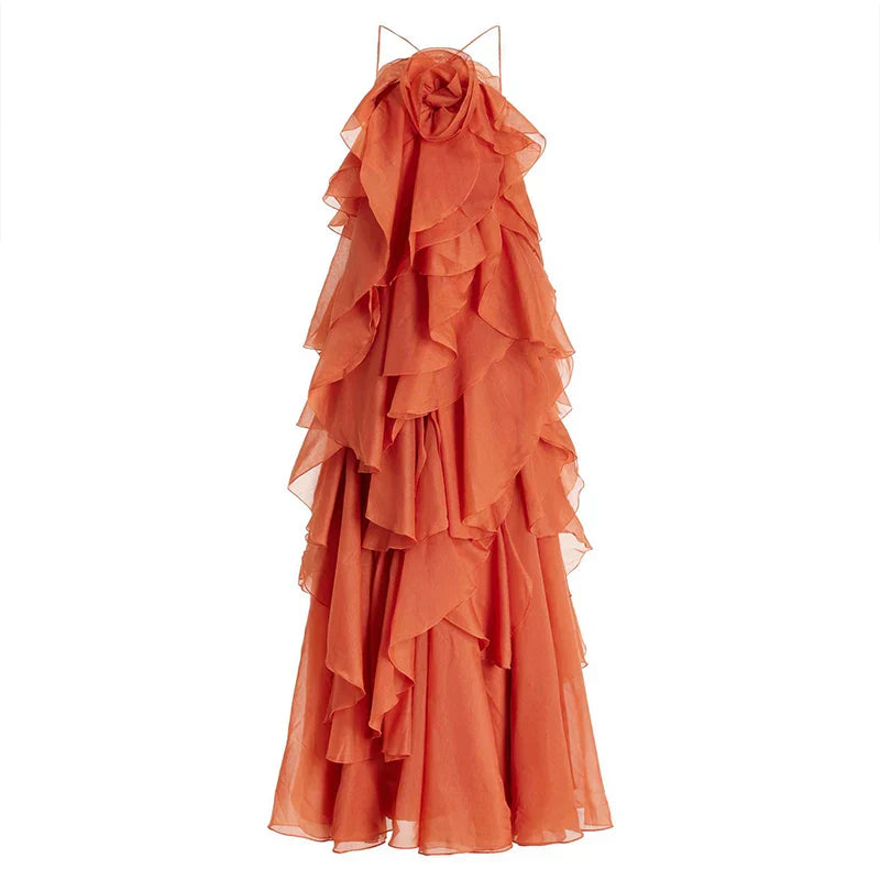 Orange maxi dress with ruffles, studio back view on mannequin