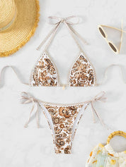 Bikini met bloemenprint en strikken wit en bruin vooruitgezien