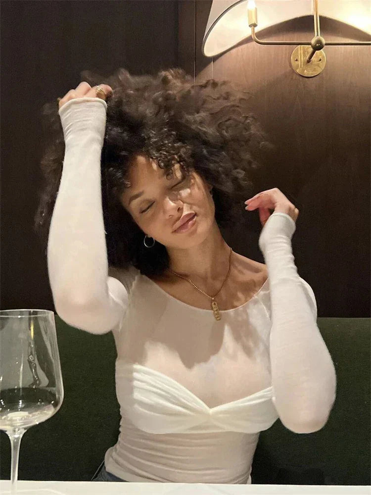 White off-shoulder top with ruched detail model portrait