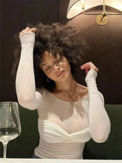 White off-shoulder top with ruched detail model portrait