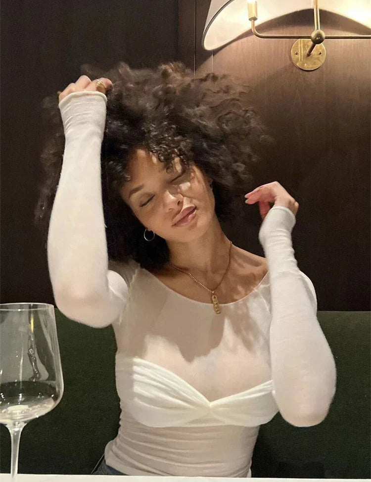 White off-shoulder top with ruched detail model portrait