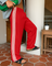 Rode patchwork broek met witte strepen en hoge taille, zijprofiel