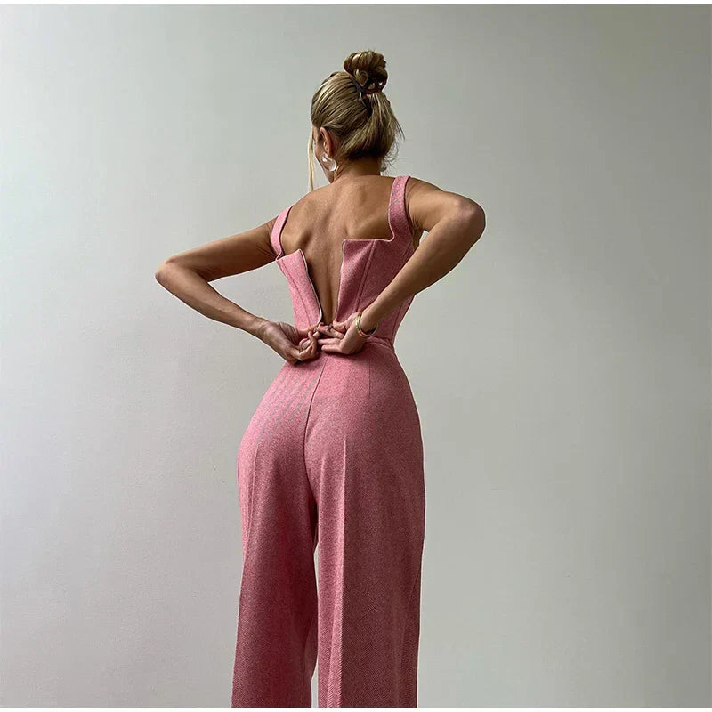 Dames jumpsuit roze met open rug achterzijde