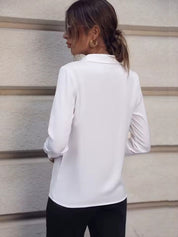 Blouse witte stof lange mouwen achterzijde