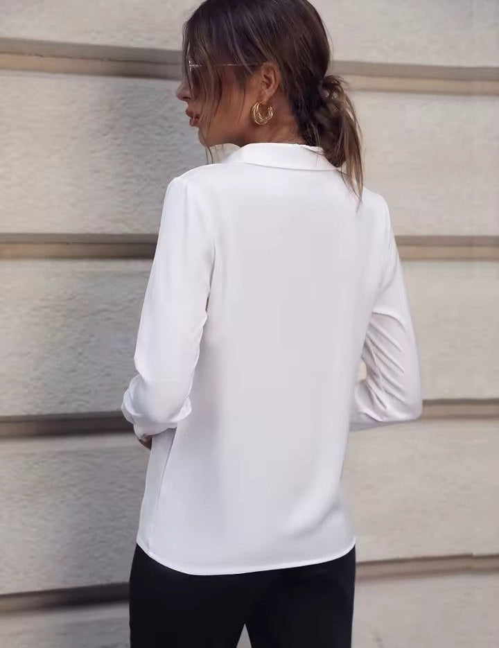 Blouse witte stof lange mouwen achterzijde