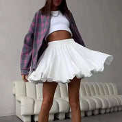 White pleated skirt with elastic waist front view