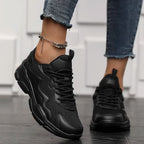 Sneakers zwart mesh en leer vooraanzicht