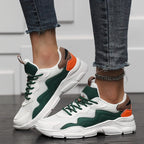 Casual sneakers wit, groen en oranje met dikke zool vooraanzicht