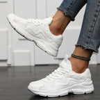 Sneakers wit textiel met kleurblokken detail shot