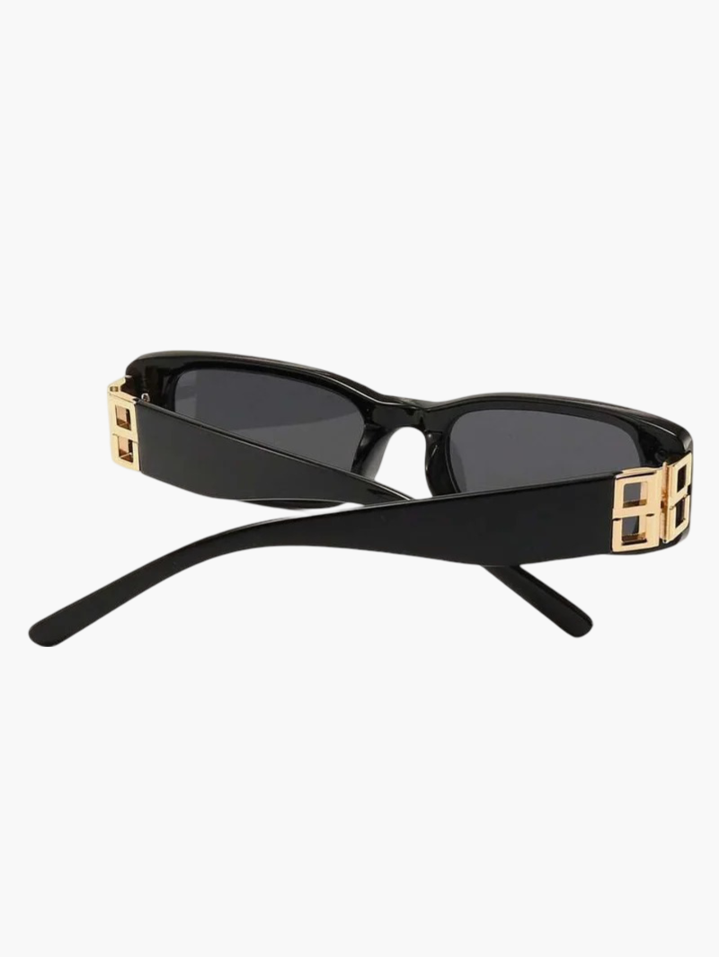 Black acetate sunglasses with gold logo detail, side view