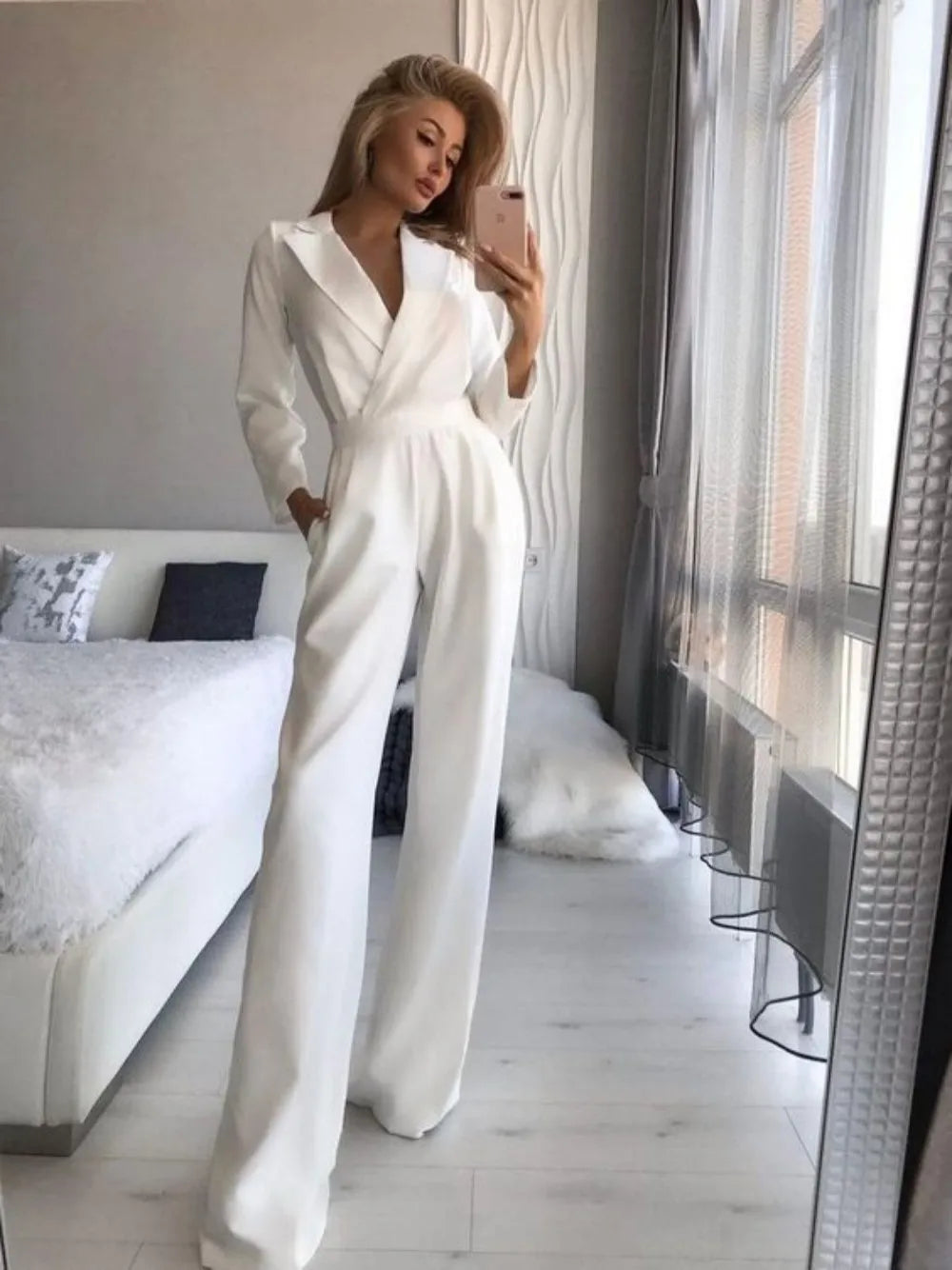 Dames jumpsuit witte stof met elastische taille front view
