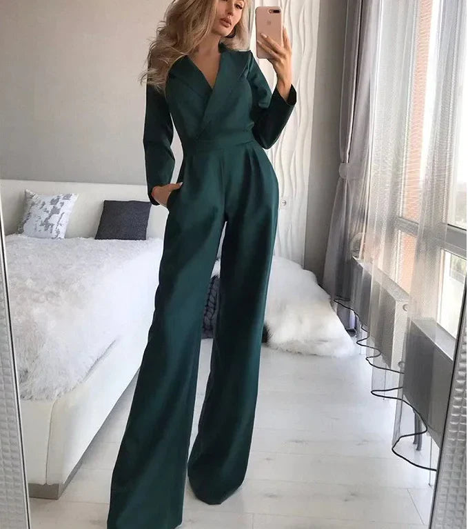 Dames jumpsuit donkergroen met elastische taille zijprofiel