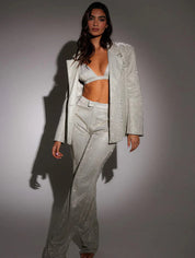 Ivory glitter suit side profile with blazer and pants