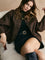 Brown blazer boxy fit front view with model seated