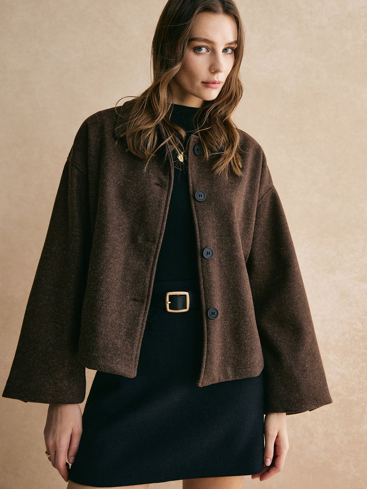 Brown blazer boxy fit front view with model standing