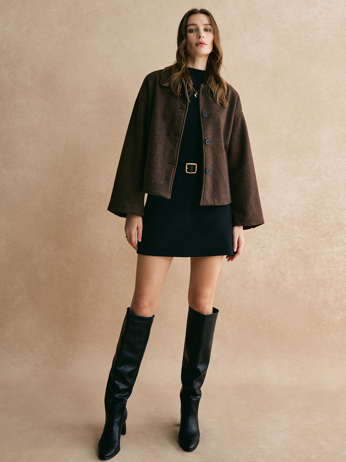 Brown blazer boxy fit full body view with model wearing boots