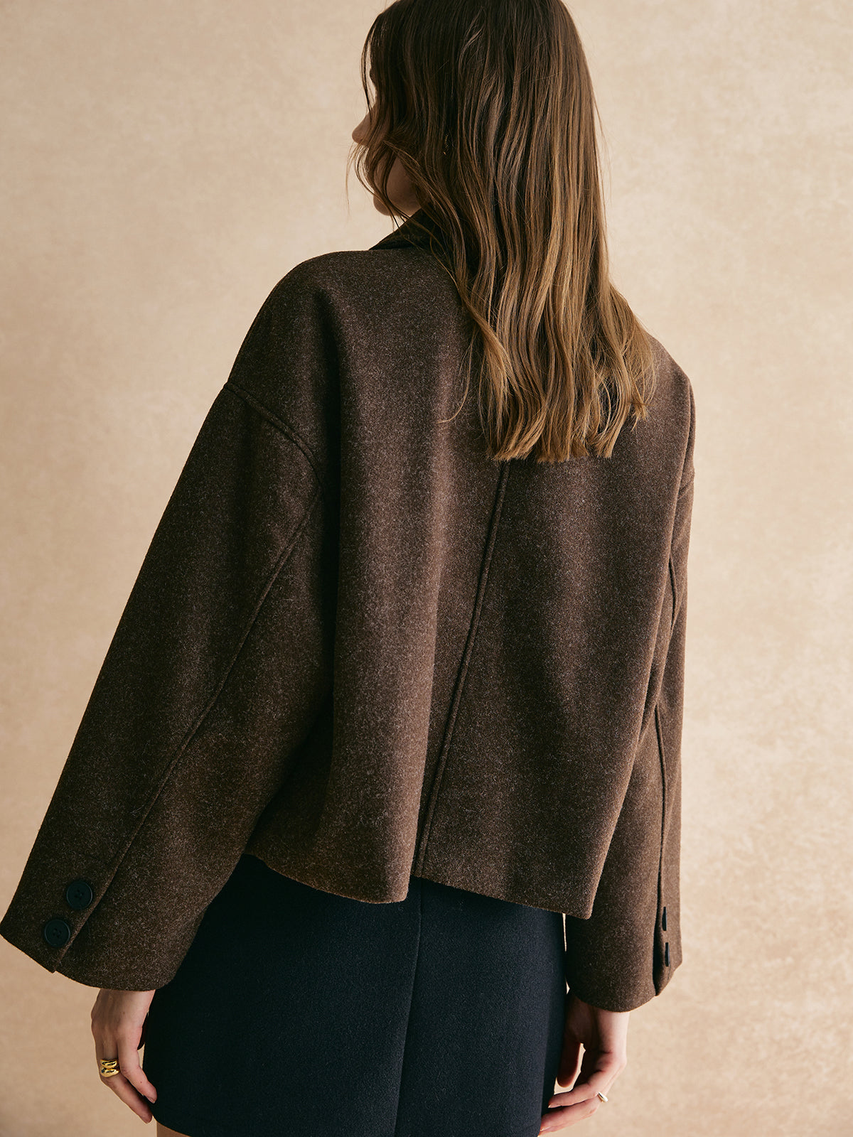 Brown blazer boxy fit back view with model standing