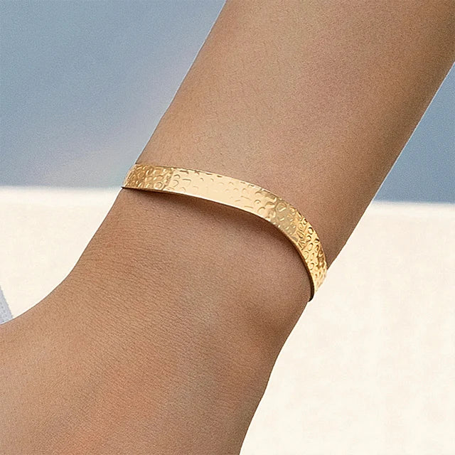 Gold textured armband, angled view