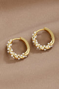Gold hoop earrings with pearl accents, front view