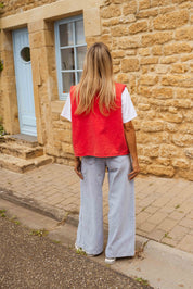 Red sleeveless gilet with buttons back view