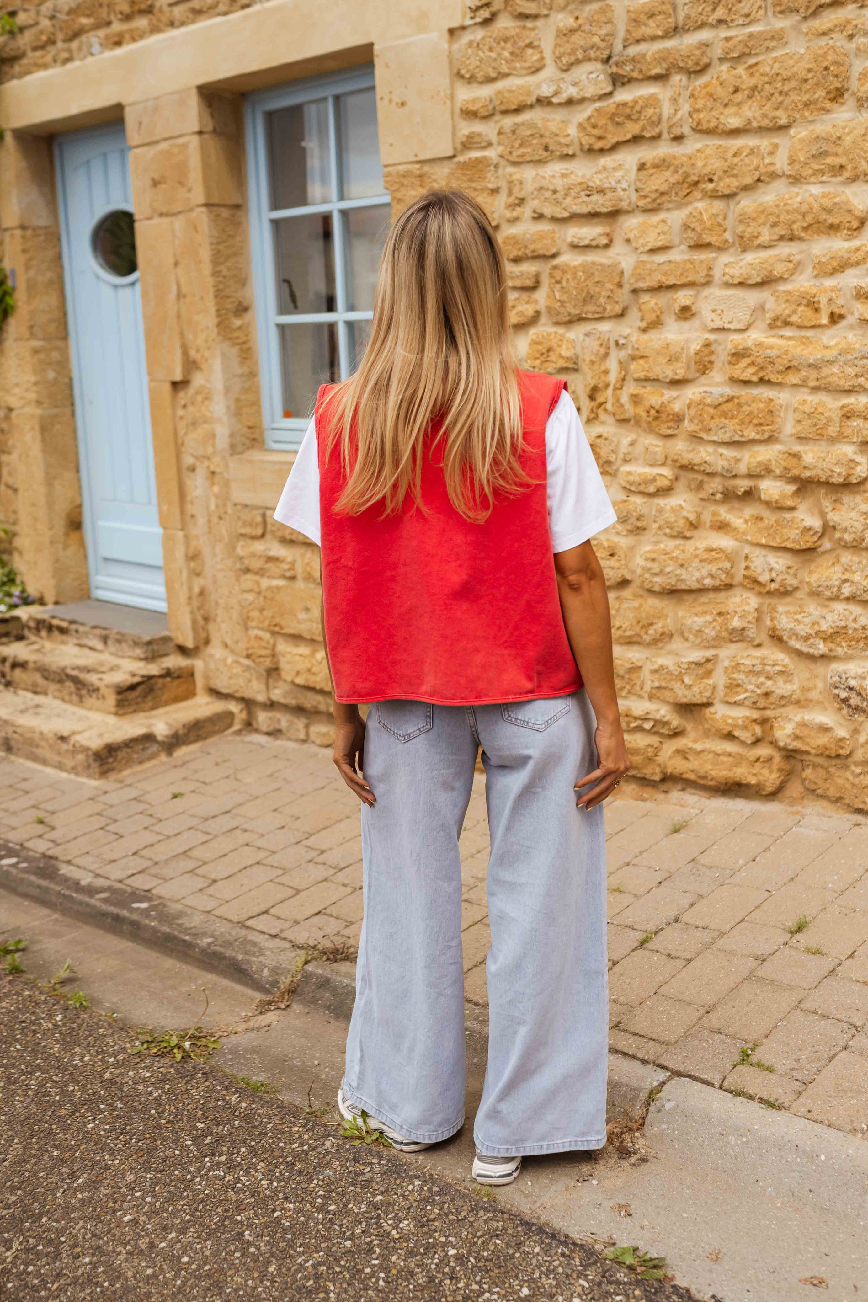 Red sleeveless gilet with buttons back view