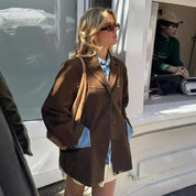 Brown suede trench coat street style front view