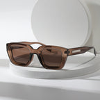 Sunglasses brown translucent square frame with metal temple accents front view
