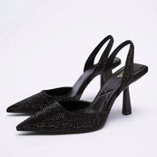 Black glitter slingback heels front view
