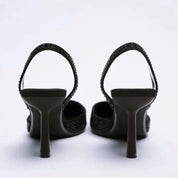 Black glitter slingback heels back view