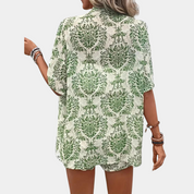 Zomerse blouse met groen patroon en korte mouwen rugzijde