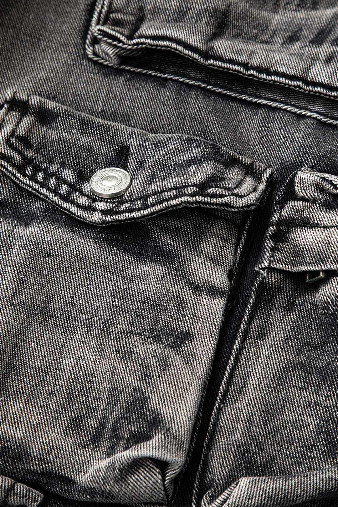 Cargo jeans pocket detail close-up