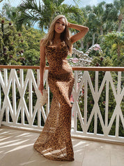 Leopard print dress front view on balcony