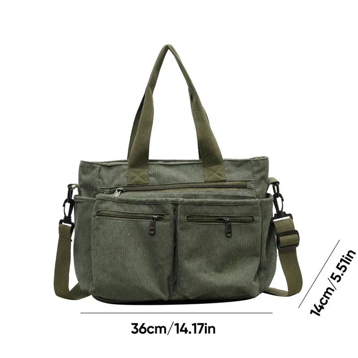 Green corduroy shoulder bag with multiple pockets front view with size dimensions