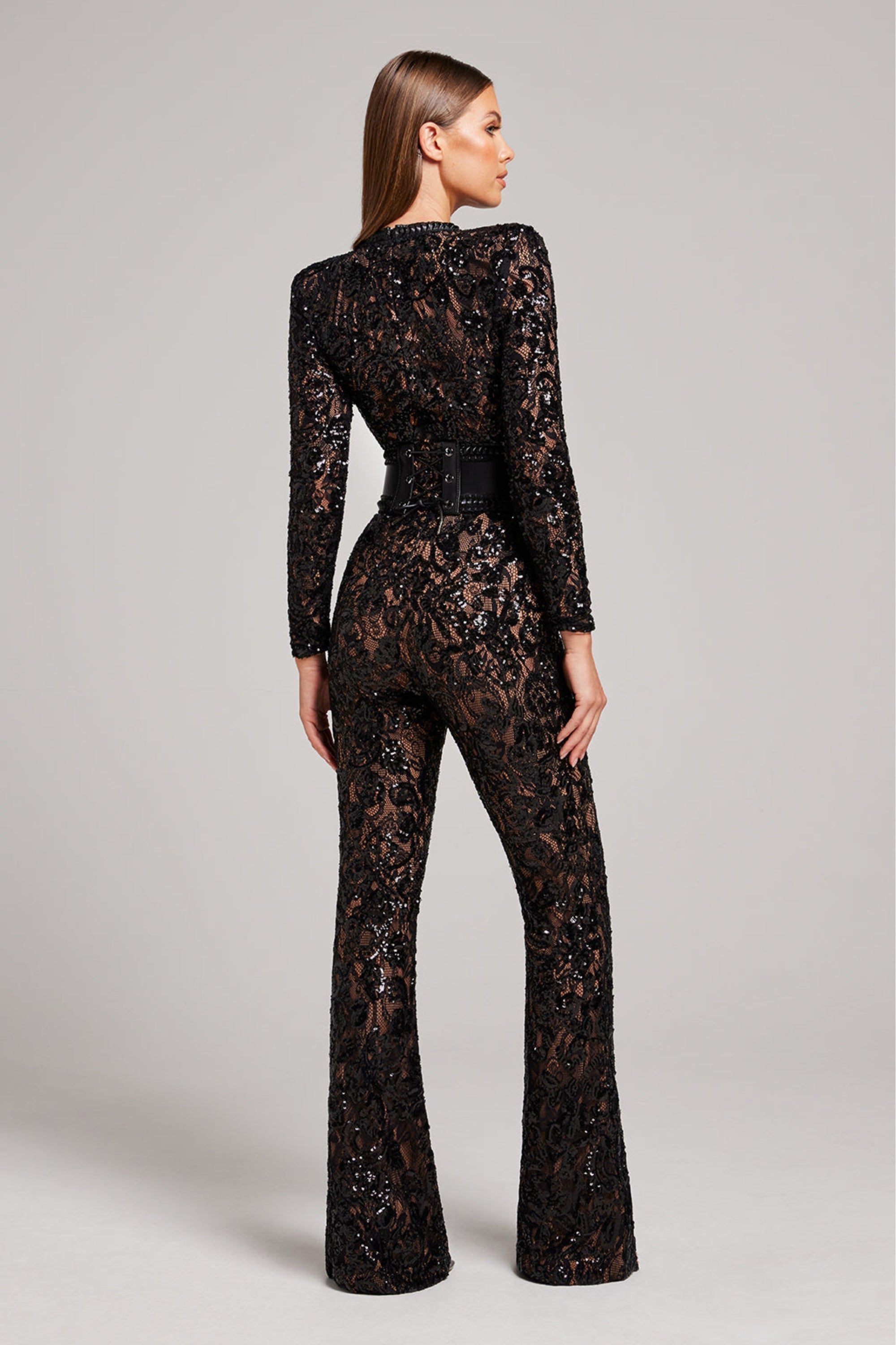 Jumpsuit zwart kant met sequins en tailleband zijkant