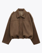 Damesjas bruin suède met capuchon detail